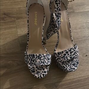 Bamboo Women's Black and White Heeled Sandals